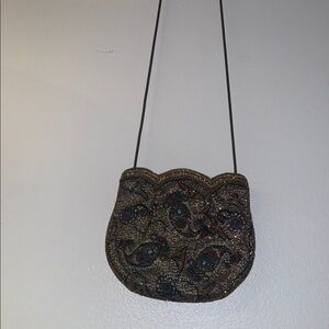 Brown and Gold Crossbody Bag with Intricate Design - Preloved
